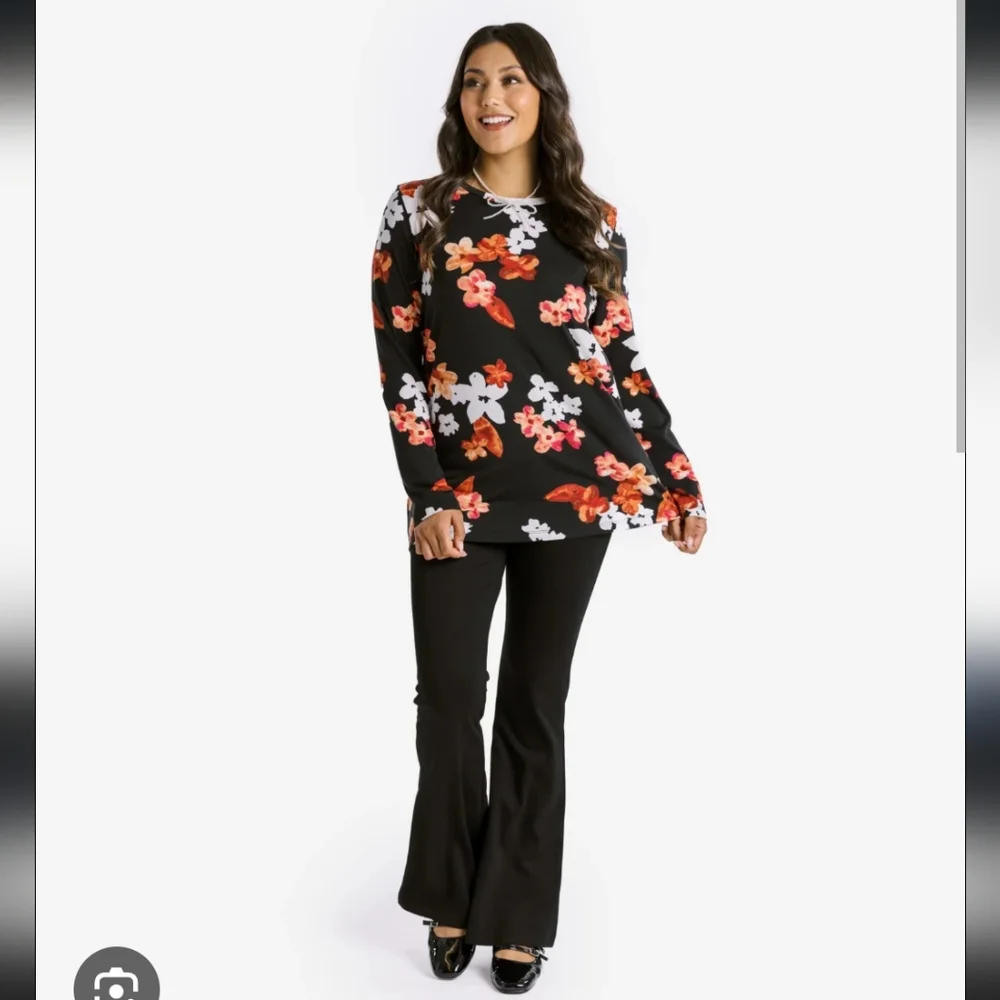 LuLaRoe Long Sleeve Top Size Medium Black With Red Orange White Floral Design - Picture 8 of 8